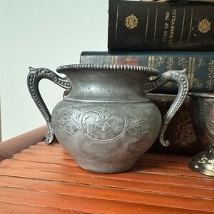 Antique sugar jar candle holder.